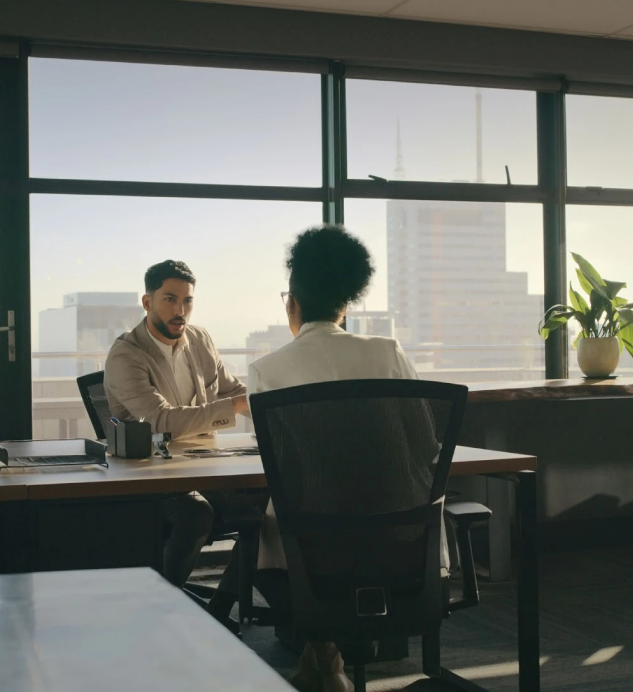 Office meeting with two people
